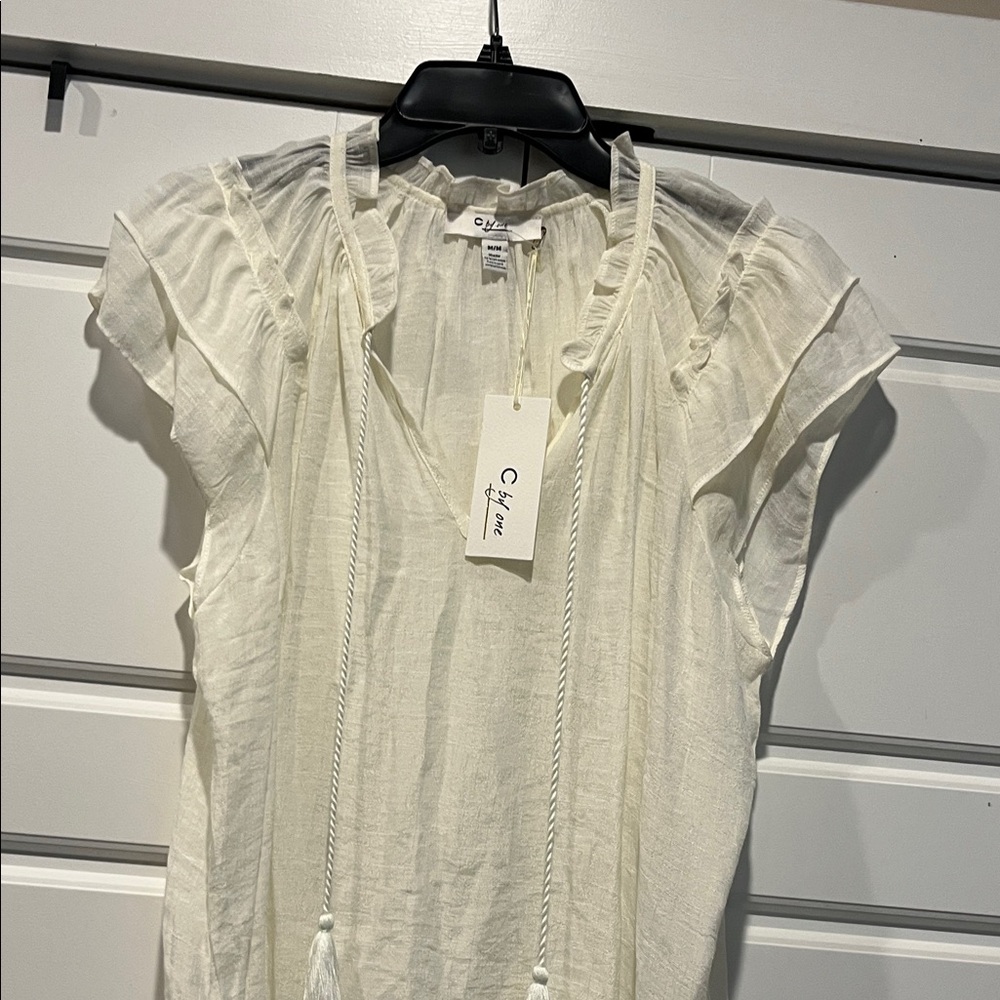 Chic Cream Ruffled Blouse by Clyne